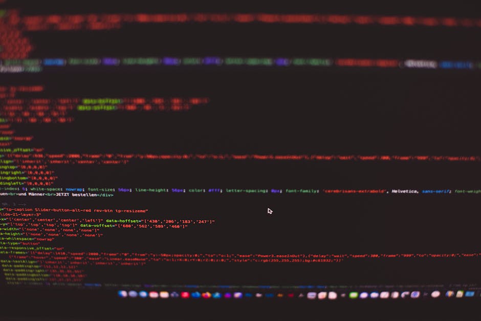 A computer screen displaying lines of HTML code with tags such as <!DOCTYPE html>, <html>, <head>, <meta>, <title>, and <link>. The code is written in a text editor